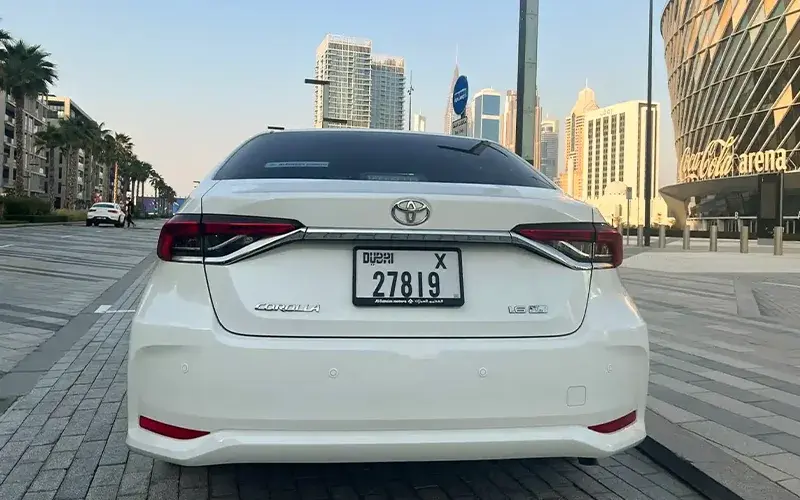 Toyota Corolla rent in Dubai - behind view
